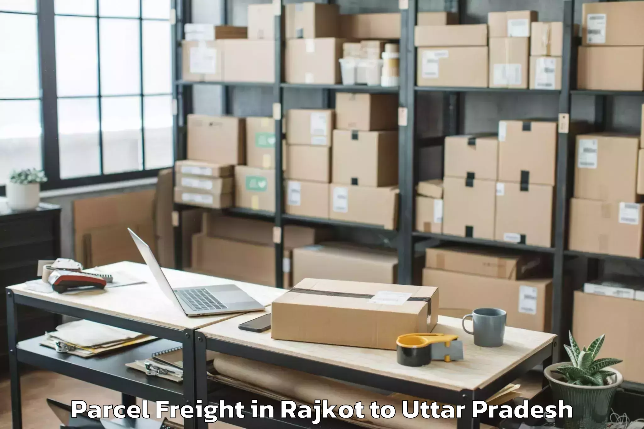 Book Rajkot to Pukhrayan Parcel Freight Online